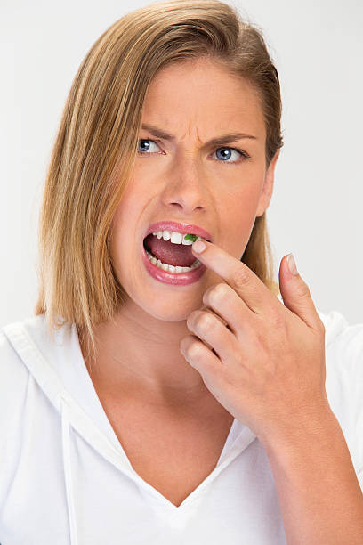 Food Stuck In Your Teeth Tips To Remove The Object