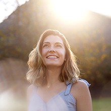 Woman smiling outside